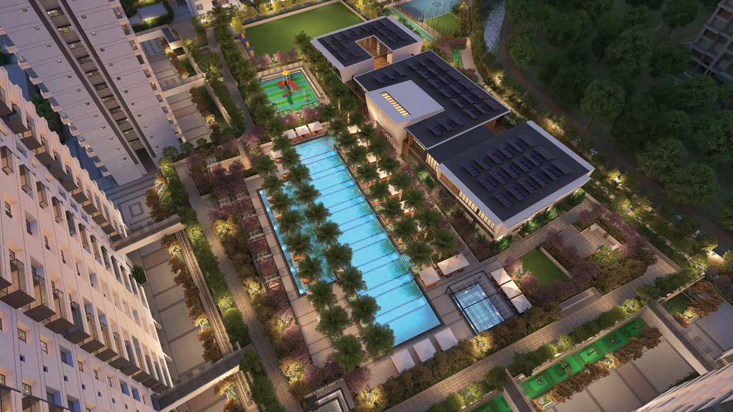 90,000 sq. ft. Podium, 50m Swimming Pool & Clubhouse at Dusk